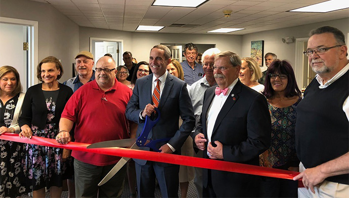 Senator Santarsiero with local residents, business owners, and officials as he cut the ribbon for his district office in Newtown