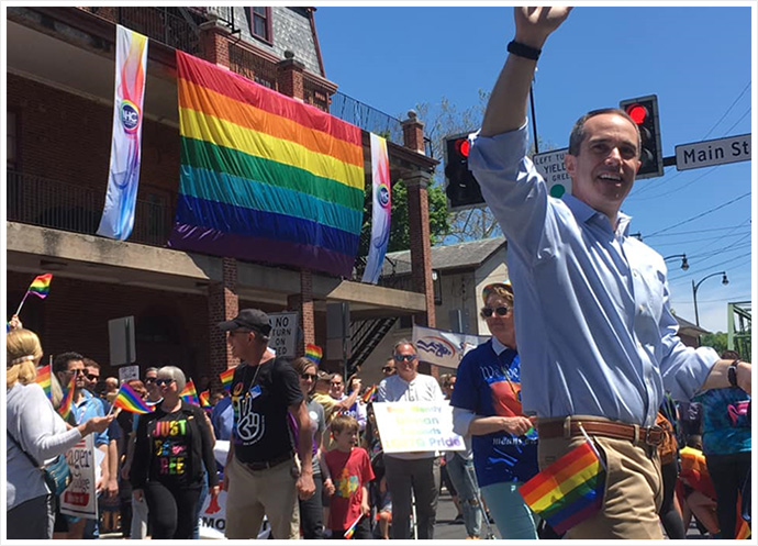 Senator Santarsiero marching in downtown New Hope during the Pride Parade